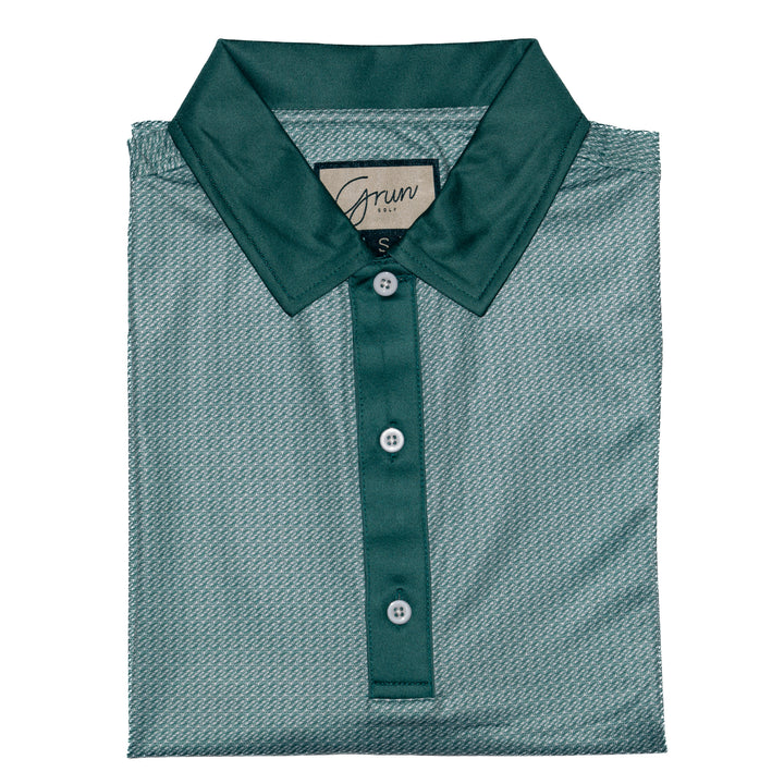 The "OG" is our branded GG geometric print overlayed on performance fabric. Lightweight and made out of recycled polyester with 4-way stretch technology makes our polo one of the most comfortable ones on the market. 